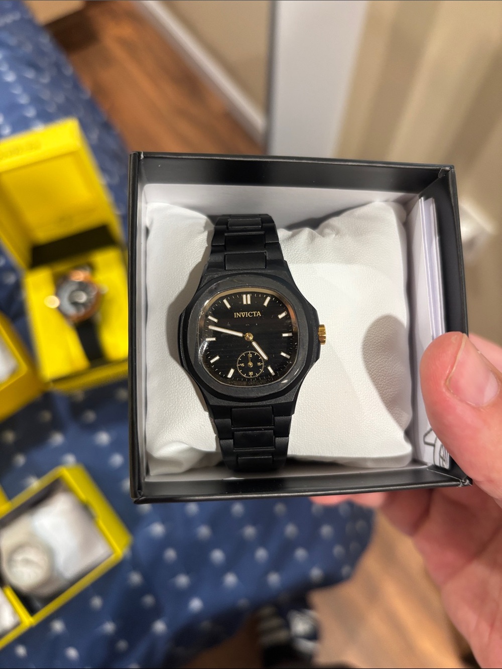 Invicta Black Watch with Gold Accents